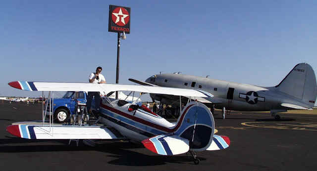 Fueling 14F with a WWII Curtis Commando in the background